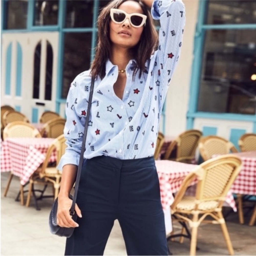 Boden Maria embroidered blue striped shirt featuring a "LOVE" text and stars.